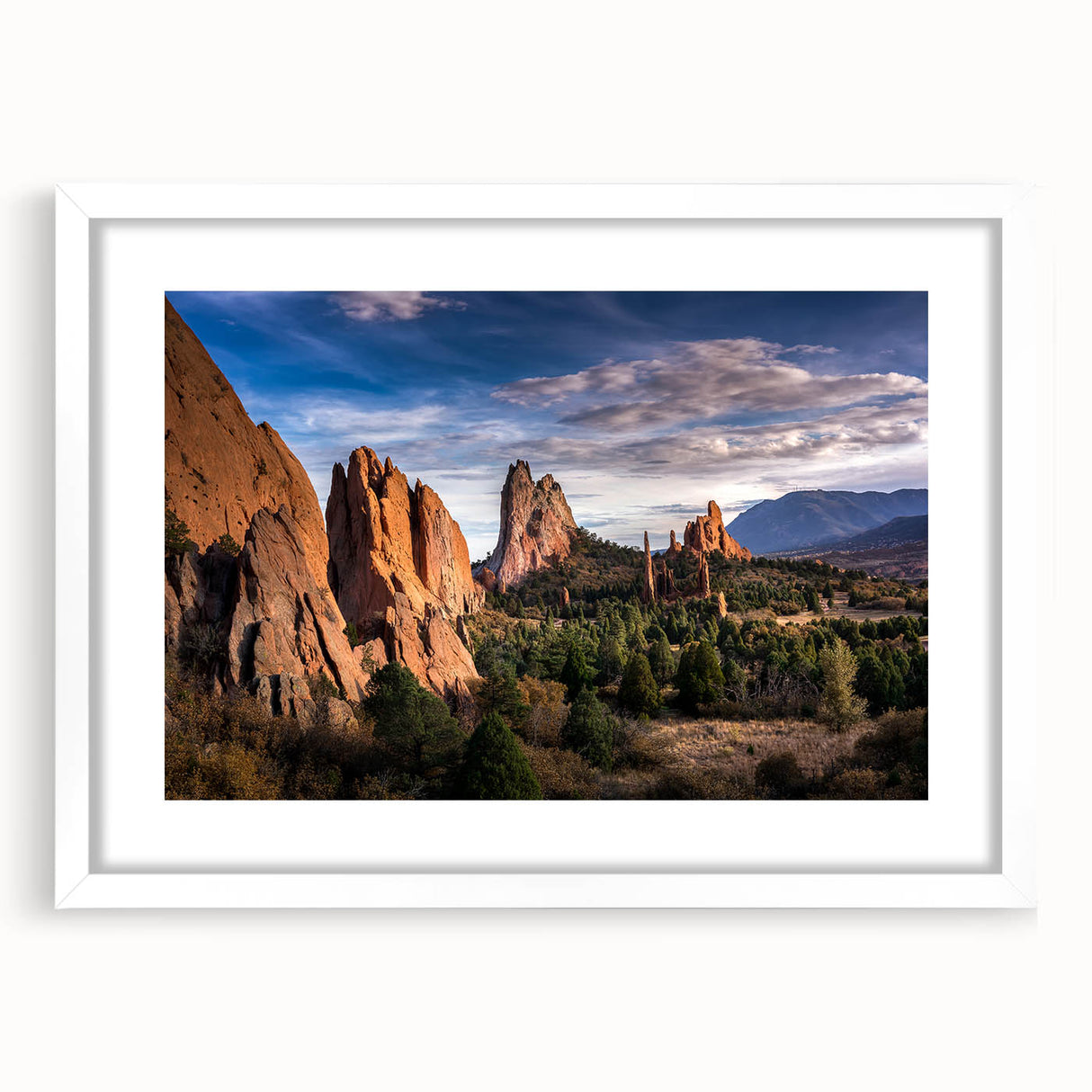 Abstract art print of Colorado Springs in muted earth tones on a framed white matte.