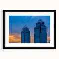 Colorful abstract art print of Atlanta skyline in vibrant hues on a large framed canvas, suitable for living room decor.