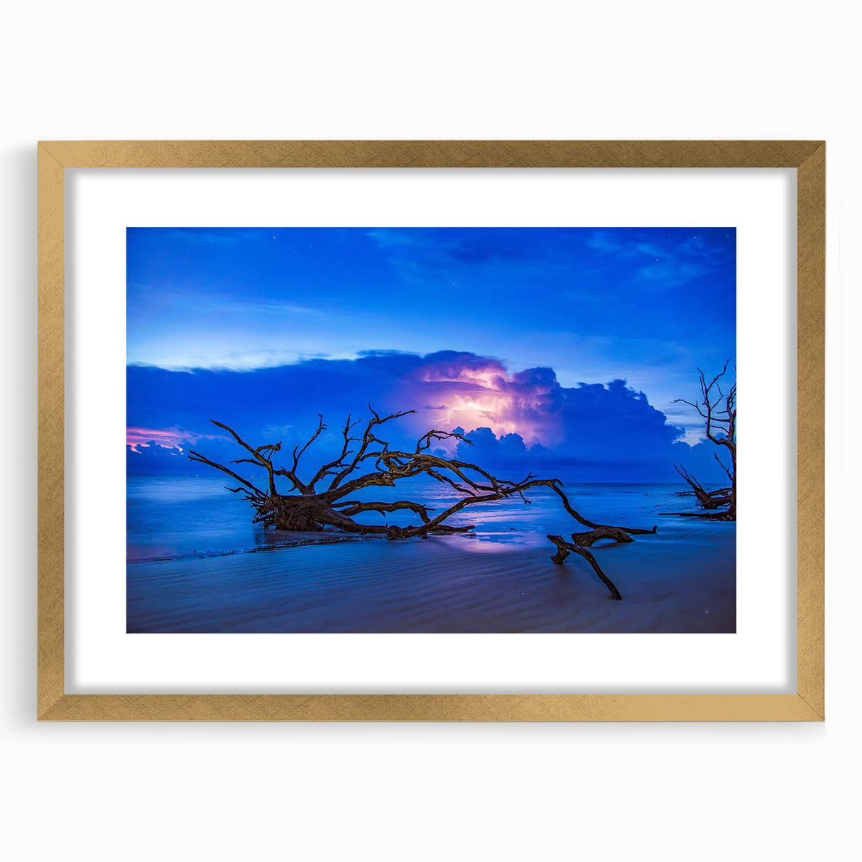 Extra large abstract art print of Savannah scenery in muted earth tones on a textured canvas, framed in gold.