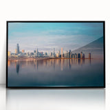 Large abstract wall art depicting the Chicago skyline in muted black and white tones, framed in black acrylic.