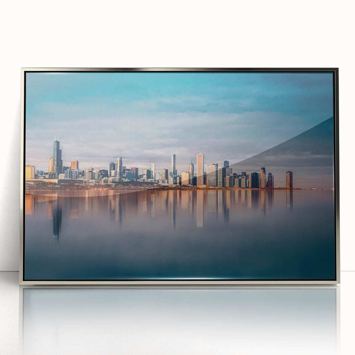 Mid-century modernist art depicting Chicago skyline in muted gray tones on a silver-framed acrylic print.