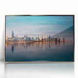 Mid-century modernist art depicting Chicago skyline in muted gray tones on a silver-framed acrylic print.