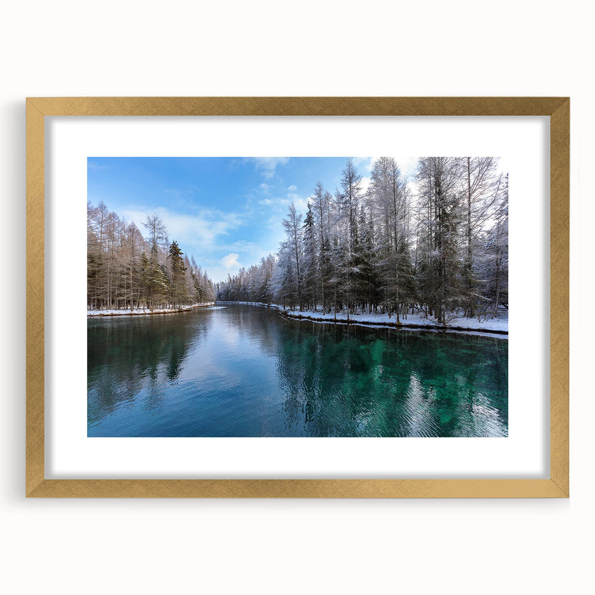 Extra large wall art featuring an abstract print of Lake Michigan in muted blue and gray tones, framed in gold.