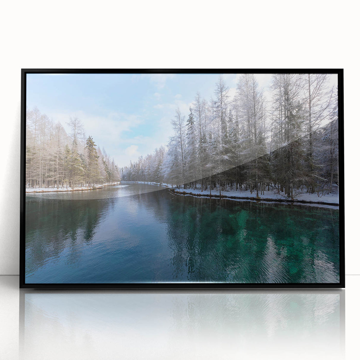 Large abstract wall art depicting Lake Michigan in muted blue and gray tones on a framed acrylic.