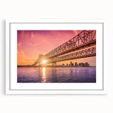 Abstract art print of New Orleans skyline in muted blues and grays, framed with white mat, ideal for dining room decor.