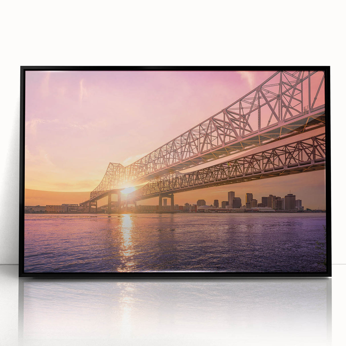 Large abstract wall art featuring a stylized New Orleans cityscape in muted gray and blue tones, framed in black acrylic.