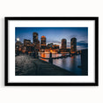 Extra large abstract art print of colorful, textured Boston skyline on black framed canvas, ideal for living room decor.