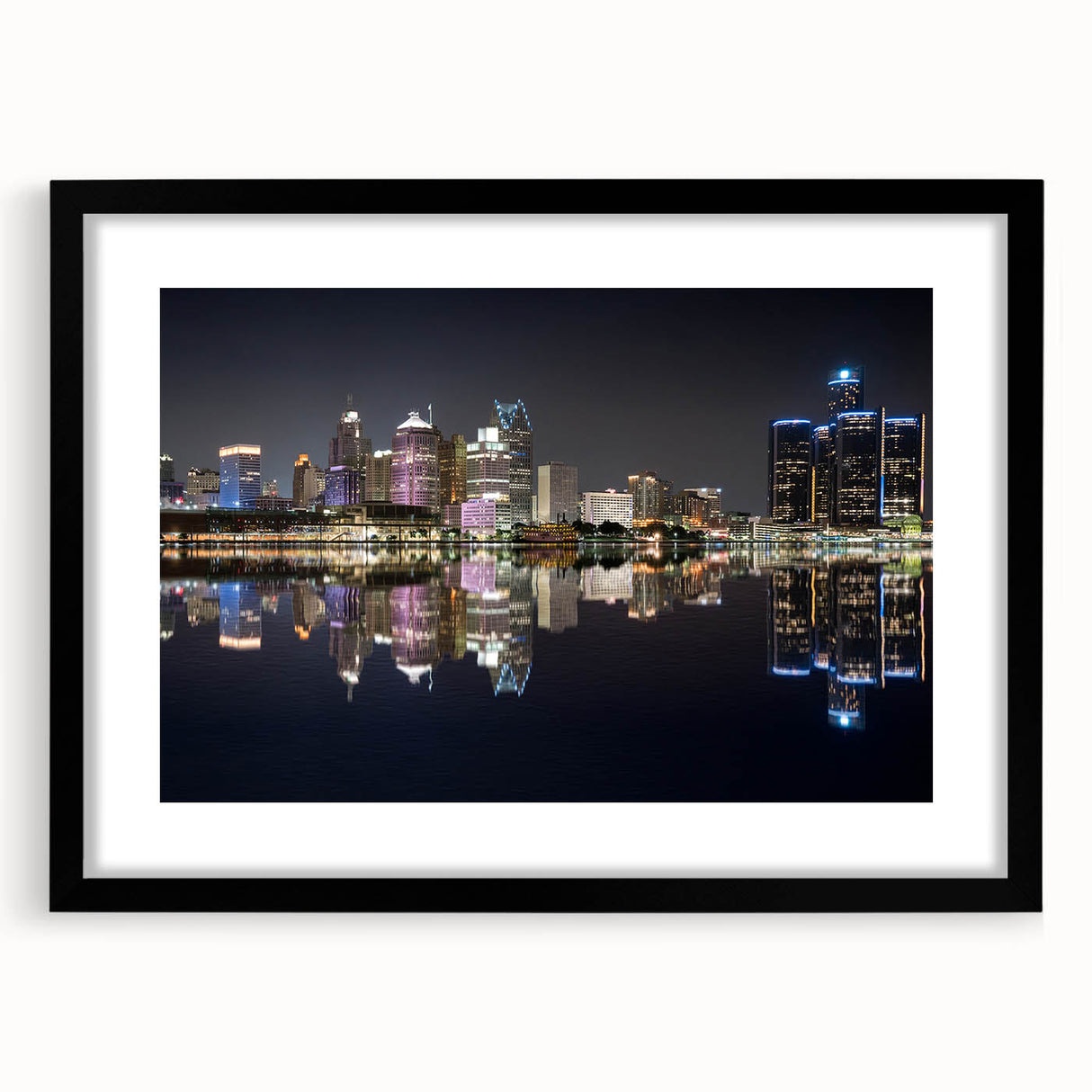 Abstract art print of Detroit skyline in vibrant colors on a large framed canvas, ideal for living room decor.
