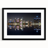 Abstract art print of Detroit skyline in vibrant colors on a large framed canvas, ideal for living room decor.