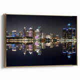 Framed canvas wall art featuring a vintage-style landscape of Detroit, Michigan in black and gold tones.