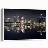 Vintage poster art of Detroit skyline in colorful hues on a large framed canvas, suitable for living room decor.