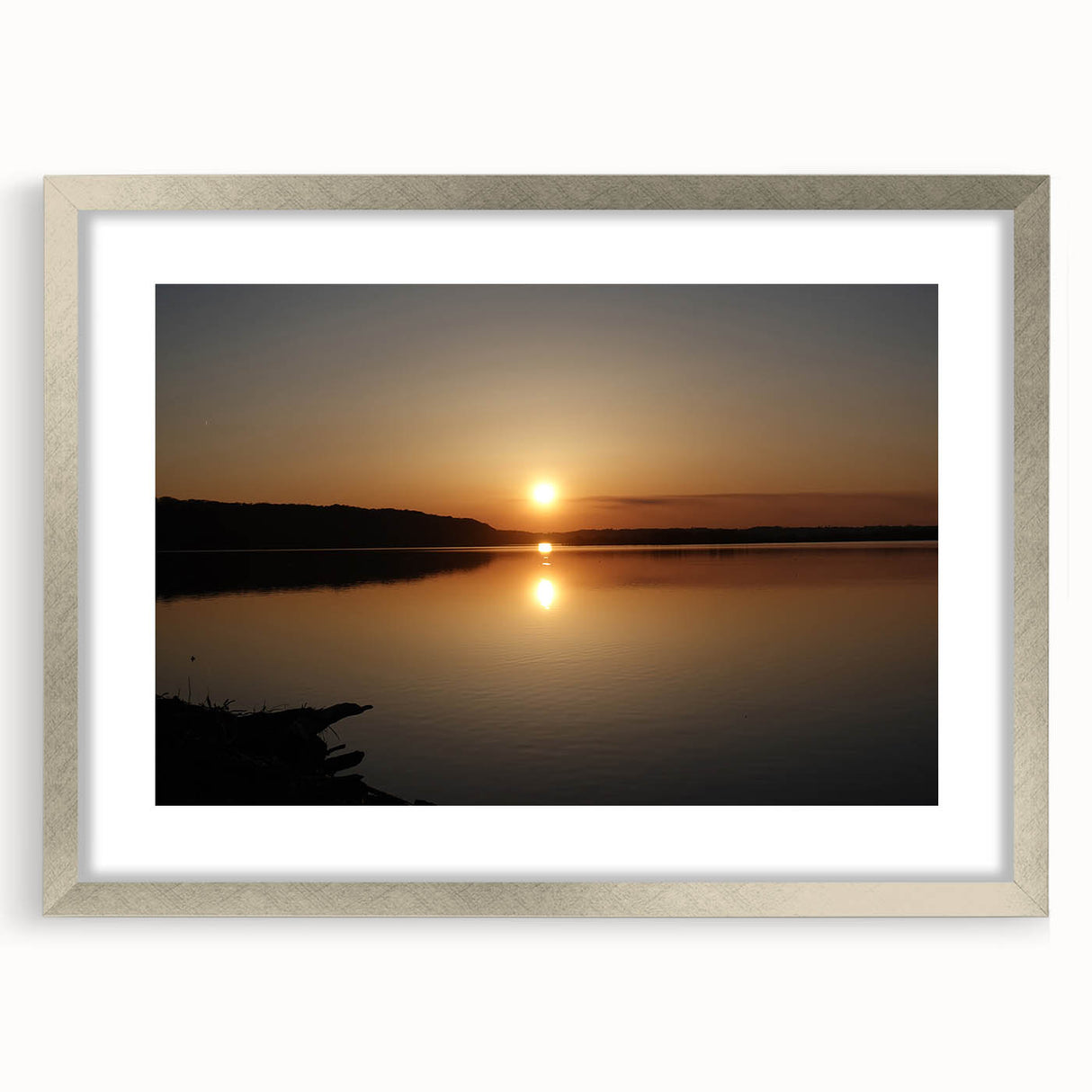 Textured abstract art print of a Mississippi landscape, rendered in muted earth tones on a framed silver mat.