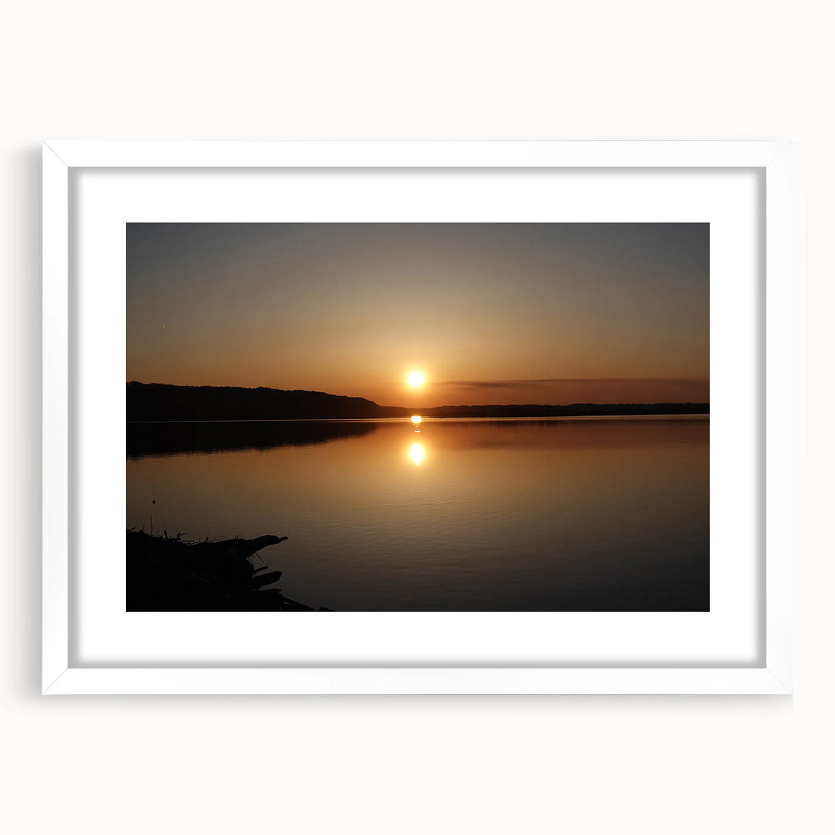Abstract art print of a Mississippi landscape in muted greens and blues on a framed white mat.