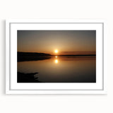 Abstract art print of a Mississippi landscape in muted greens and blues on a framed white mat.