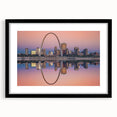 Abstract art print of St. Louis skyline in vibrant colors on a large textured canvas, ideal for living room decor.