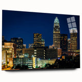 Acrylic print of a large abstract depiction of Charlotte's skyline in muted gray and blue tones.