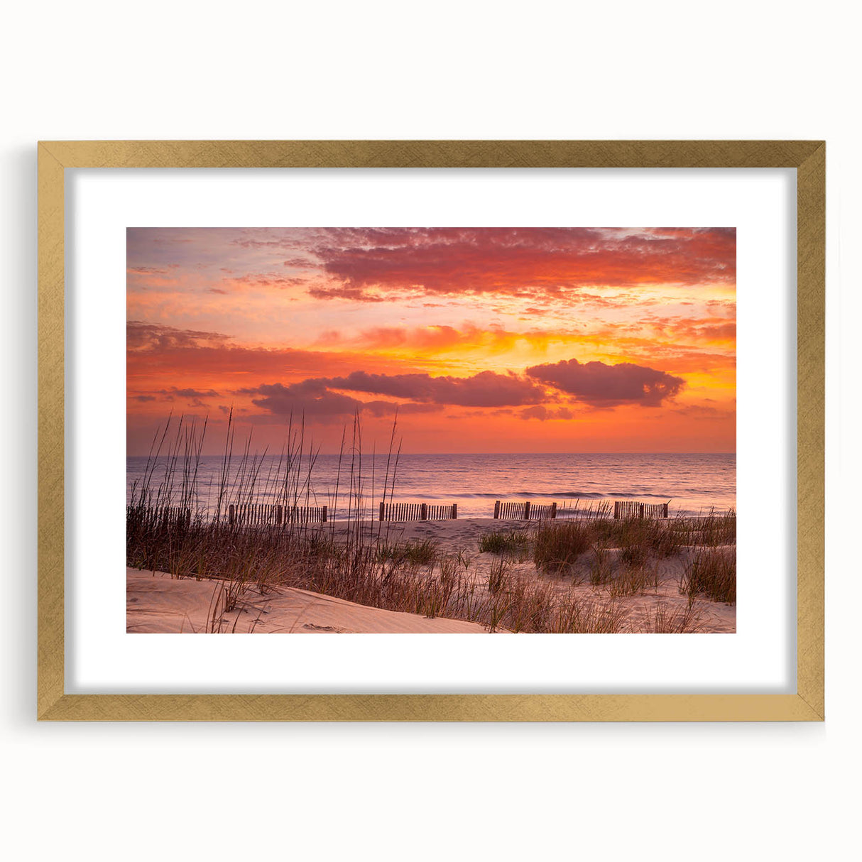 Extra large abstract art print of the Outer Banks with textured design in muted earth tones, framed in gold.