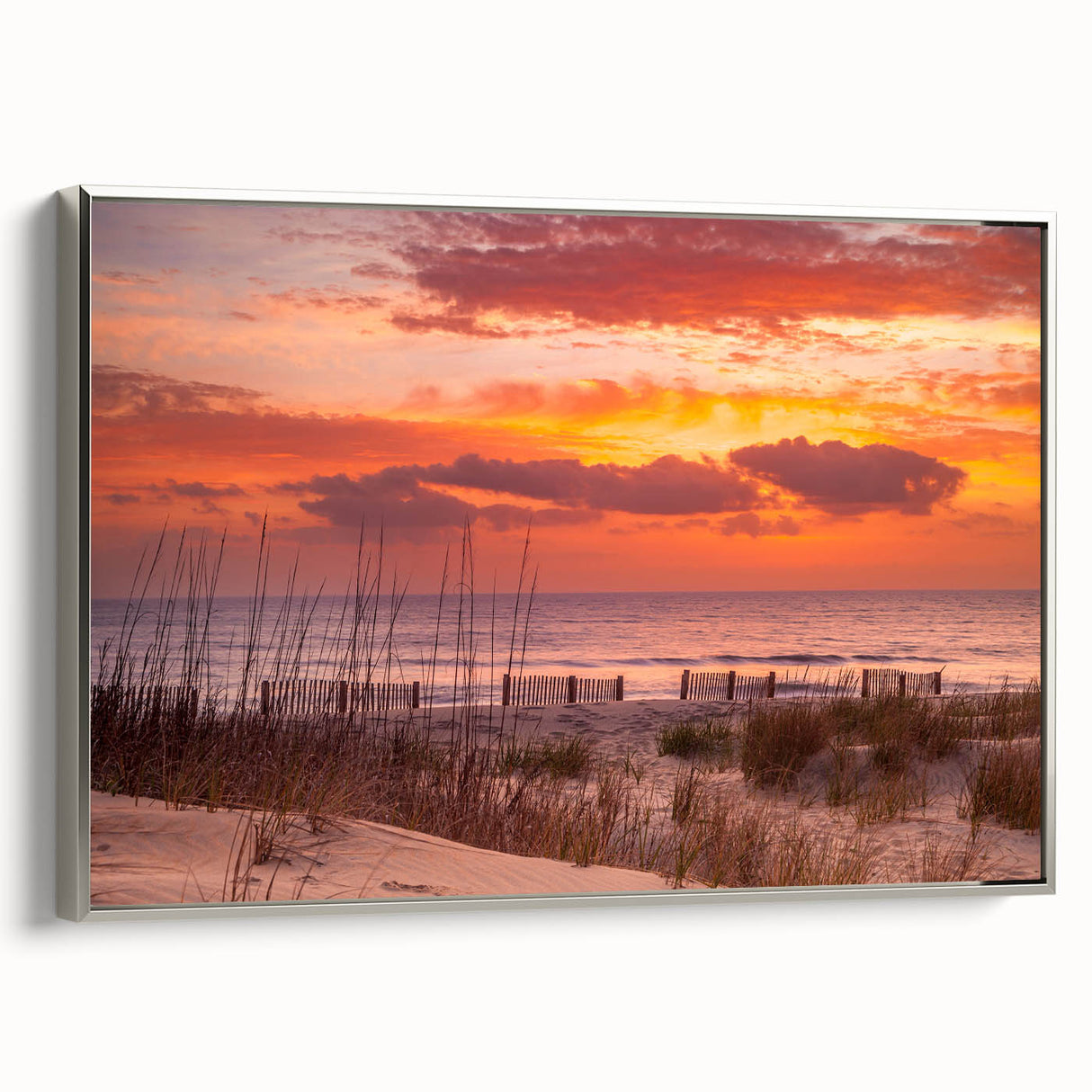Framed canvas of a vintage-style Outer Banks landscape painting featuring colorful art on a black background.