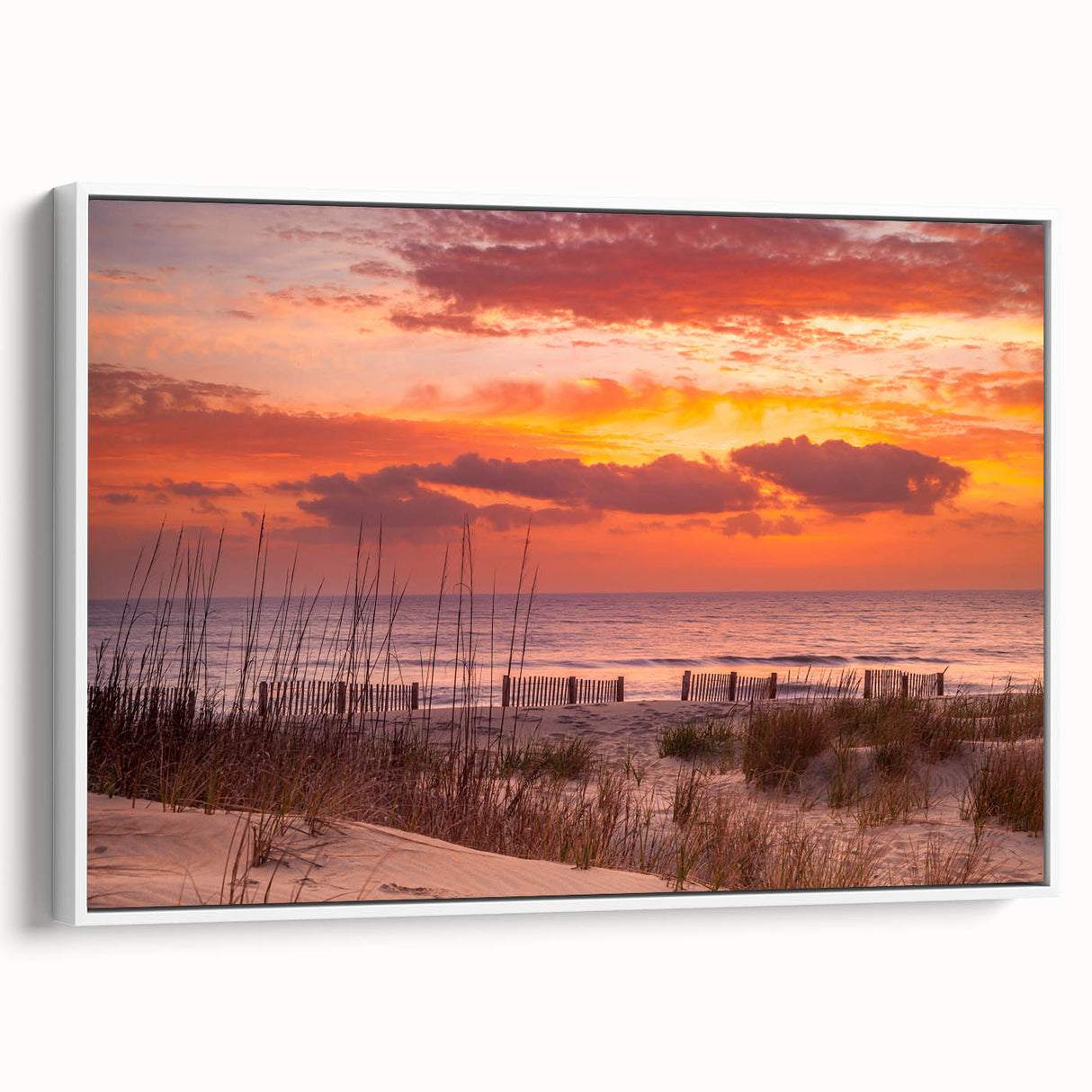 Vintage poster art of Outer Banks, North Carolina on framed canvas, featuring colorful art with black accents.