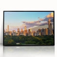 Large abstract wall art of Central Park in muted green and brown tones, framed in black acrylic.