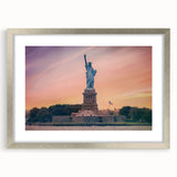 Textured art print of the Statue of Liberty in abstract style with muted blue and gray tones, framed in silver.