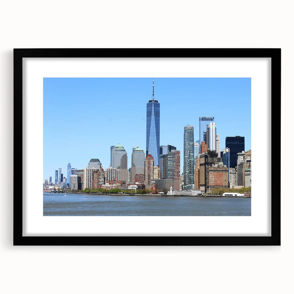 Abstract art print of NYC skyline in vibrant colors on a large framed canvas, ideal for living room decor.
