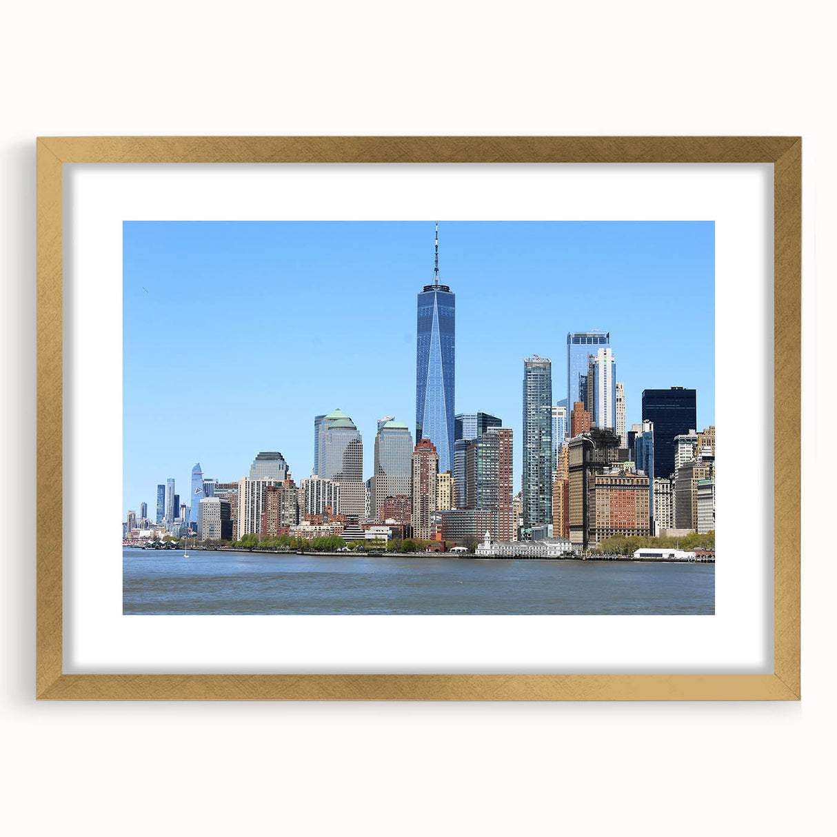 Extra large abstract art print of NYC skyline, featuring textured hues of gray and blue, in a gold frame.
