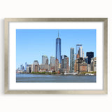 Textured abstract art print of NYC skyline in muted gray, displayed in a silver frame, ideal for bedroom art.