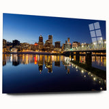 Large abstract wall art depicting the Portland skyline in muted blue and gray tones on an acrylic glass.