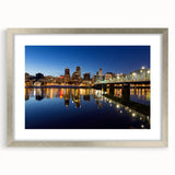 Textured abstract art print depicting Portland, Oregon, in muted gray and blue tones on a framed silver mat.