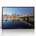Large abstract wall art depicting the Portland, Oregon skyline in muted grays and blues on a framed acrylic print.