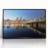 Large abstract wall art depicting the Portland, Oregon skyline in muted grays and blues on a framed acrylic print.