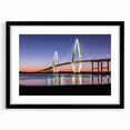 Abstract art print of Charleston scenery in vibrant colors on a large textured canvas, framed in black.