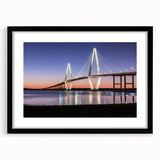 Abstract art print of Charleston scenery in vibrant colors on a large textured canvas, framed in black.