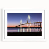 Abstract art print of Charleston scenery in muted blues and greens on a framed white mat, ideal for dining room decor.