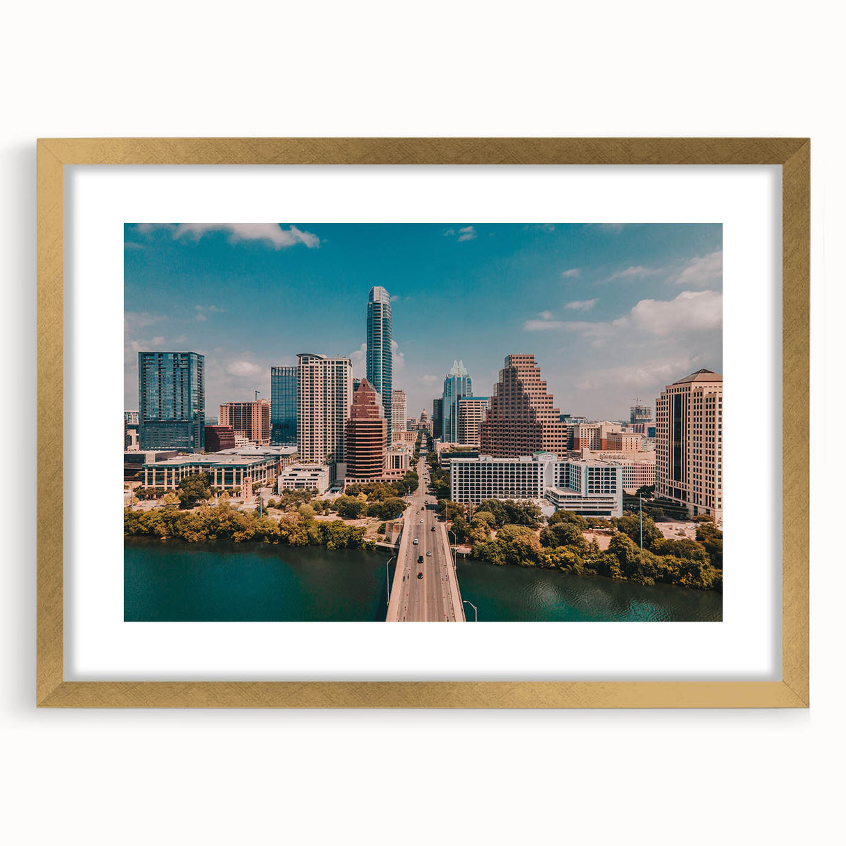 Extra large abstract art print of Austin, Texas, in textured gold frame, featuring muted earth tones.