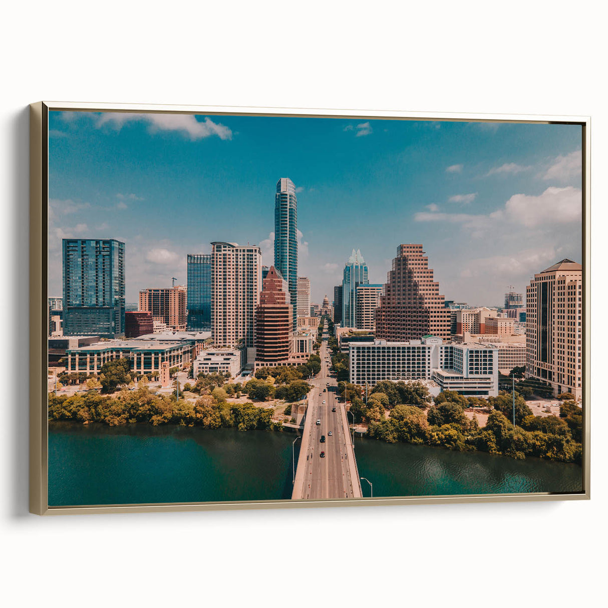 Framed canvas depicting a vintage-style Austin, Texas landscape in black and gold tones, ideal for bedroom wall art.