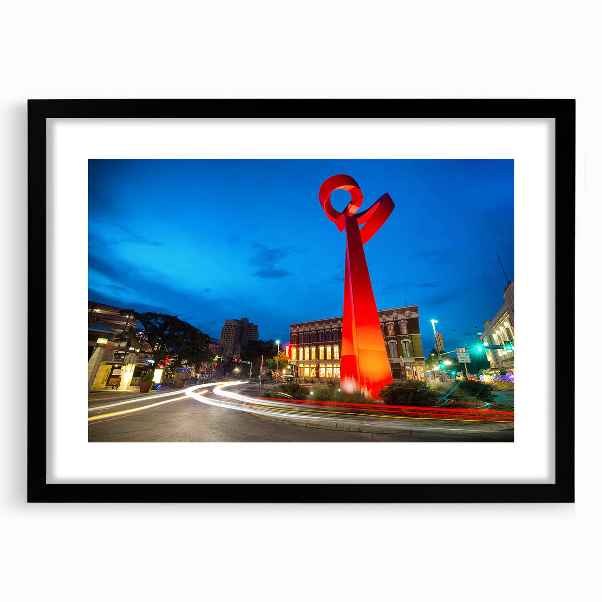 Extra large abstract art print of a colorful, textured San Antonio skyline on a black framed canvas.