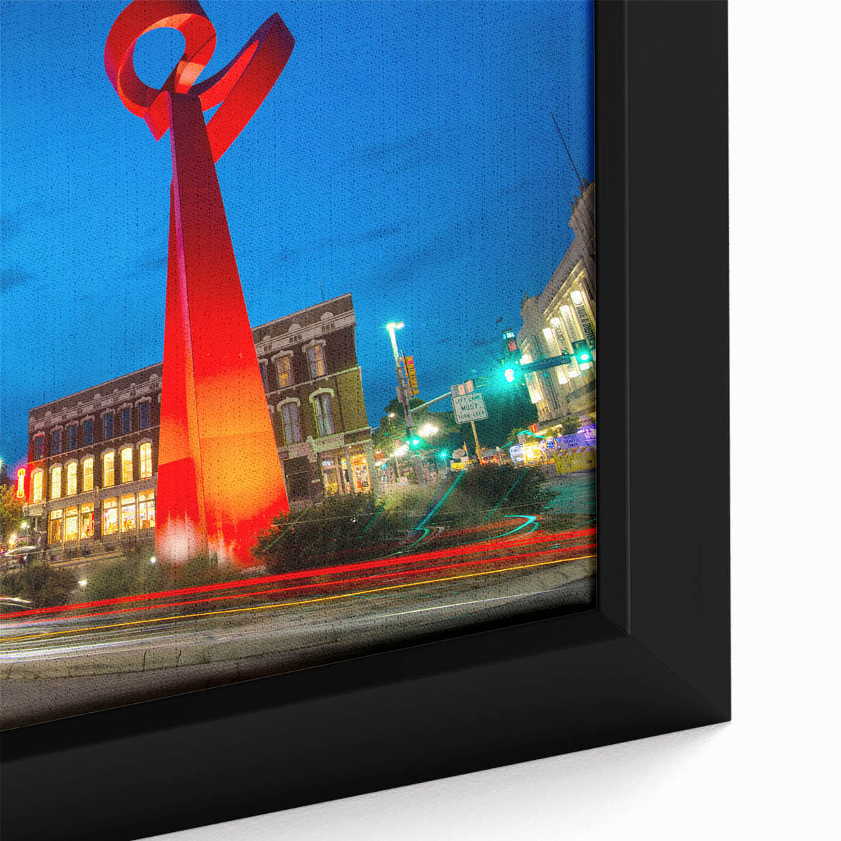 Extra large framed canvas featuring a textured depiction of the San Antonio skyline in black with colorful accents.