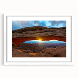Abstract art print of Arches National Park in earth tones, on a white-framed canvas, suitable for dining room decor.