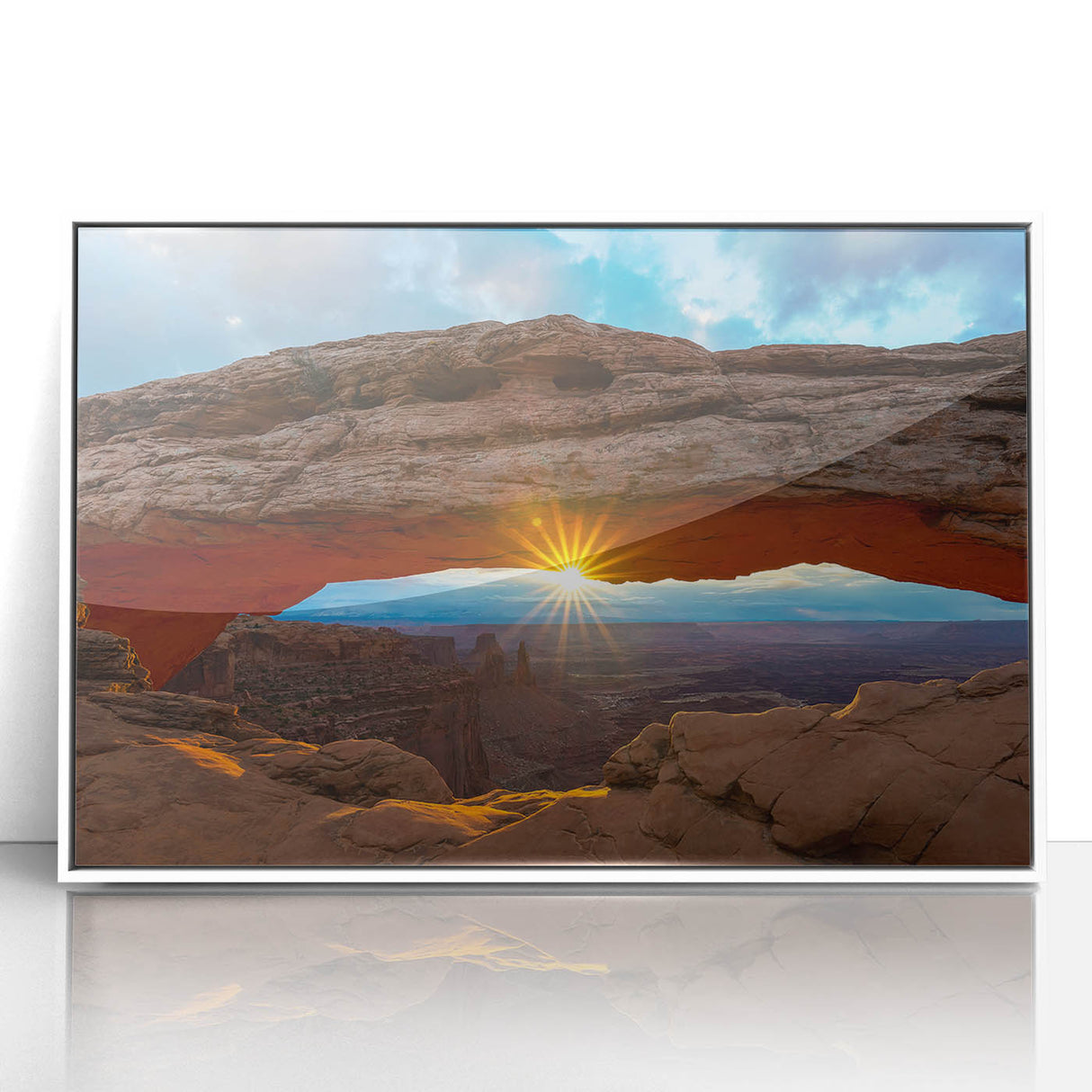 Modern art wall decor featuring a minimalist Arches National Park scene in muted earth tones, acrylic print framed in white.