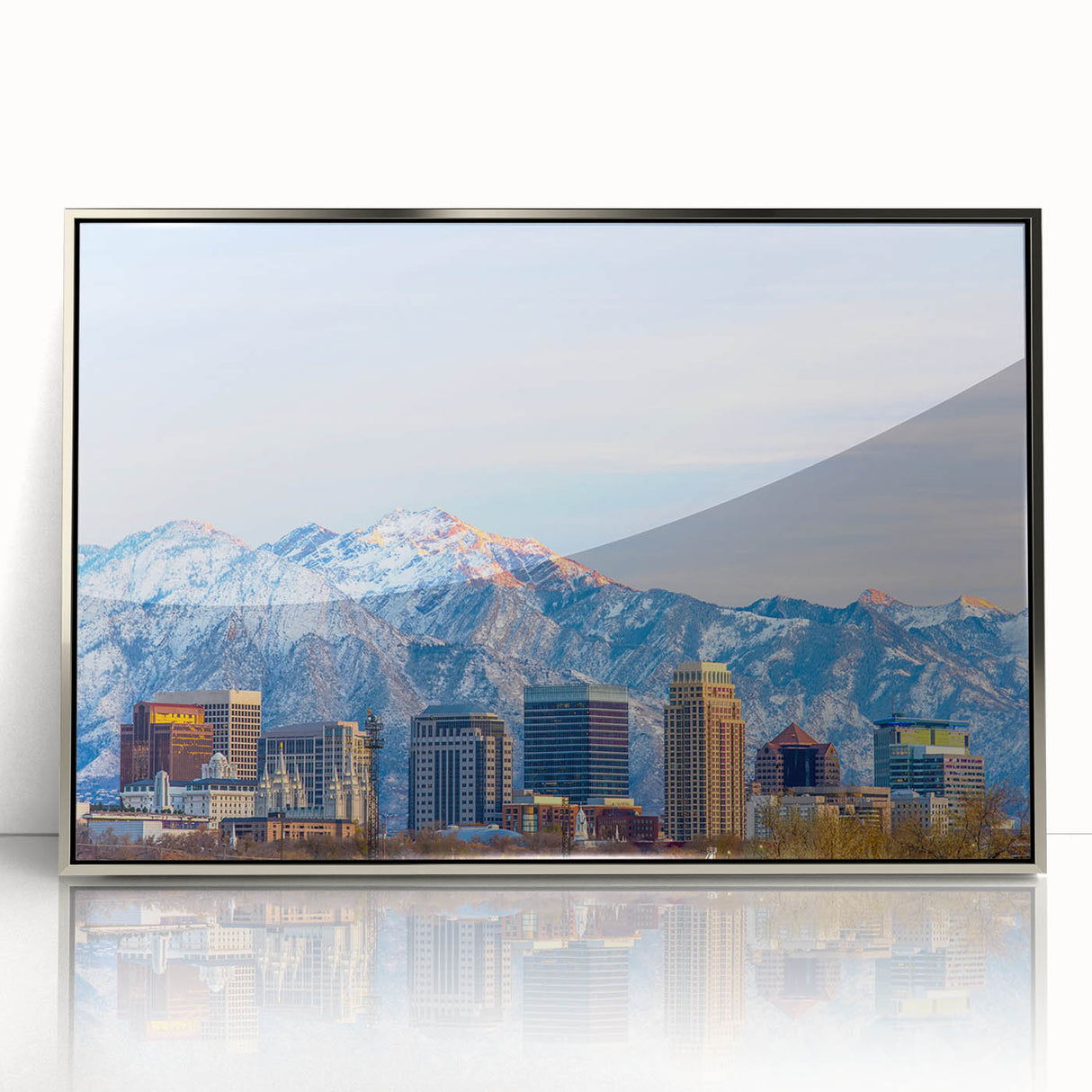 Mid-century modernist art depicting Salt Lake City in muted earth tones on a silver-framed acrylic print.