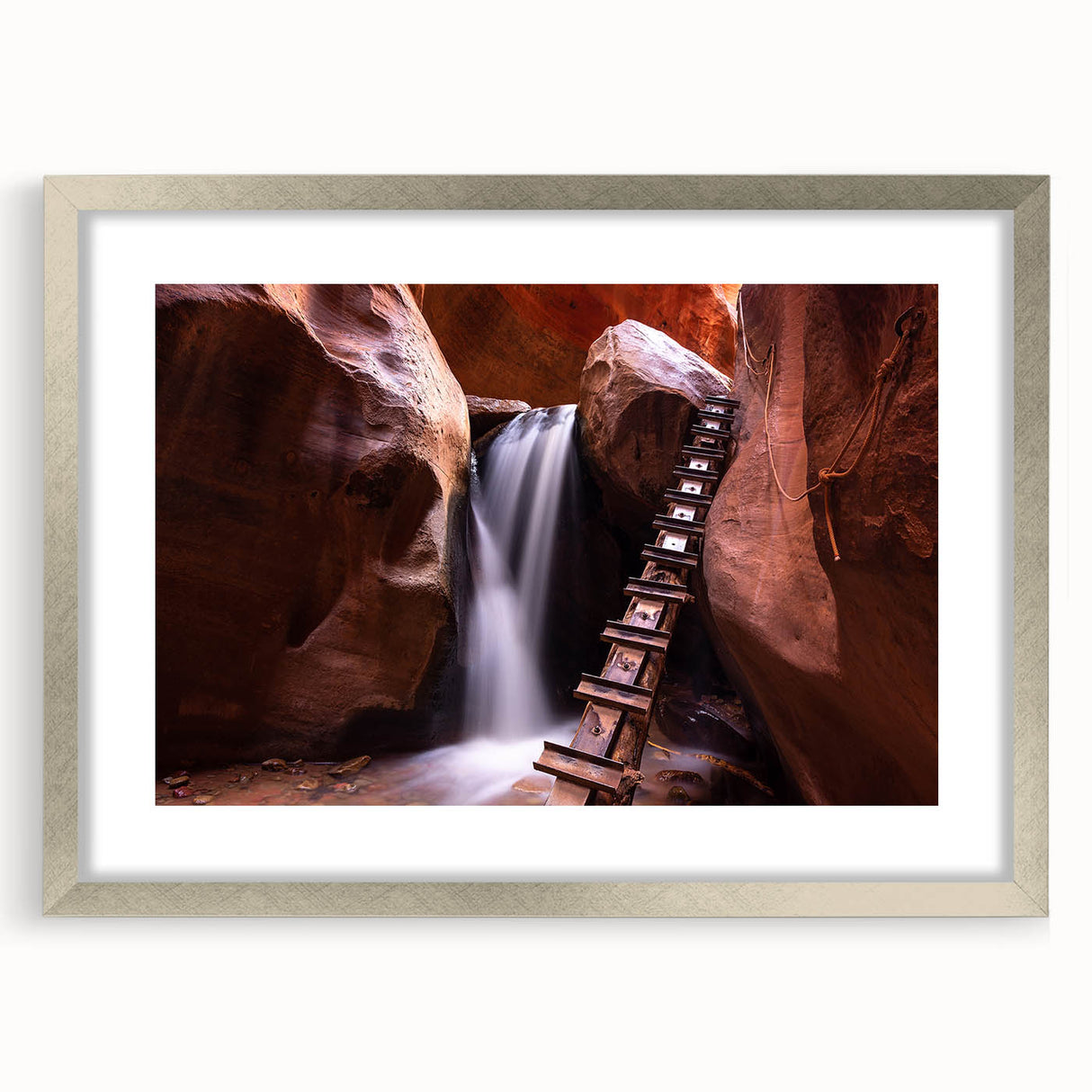 Textured art print of abstract Zion National Park scenery in muted earth tones on a silver-framed mat, ideal for bedroom art.