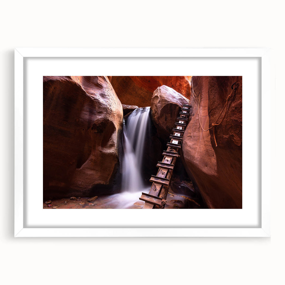 Abstract art print of Zion National Park in muted earth tones on a white framed canvas, ideal for dining room decor.