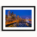 Extra large abstract art print of colorful Seattle skyline, textured appearance on black framed canvas.