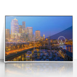 Acrylic print of Seattle skyline in muted gray tones, framed in white, suitable for modern nursery wall decor.