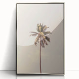 Mid-century modernist art featuring geometric shapes in pastel colors on a silver-framed acrylic print.