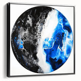 Abstract geometric framed canvas artwork in a sleek black frame, showcasing intricate patterns and vibrant colors, displayed from a side view to highlight its depth and design. Perfect for modern home decor or art enthusiasts looking to elevate their space.
