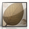 Framed wall art featuring a vibrant design of flowers and botanical leaves set against a black background, showcasing intricate details and textures for modern decor.