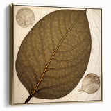 Framed canvas wall art showcasing a vibrant floral design with silver and gold accents, set against a neutral background, perfect for modern home decor.